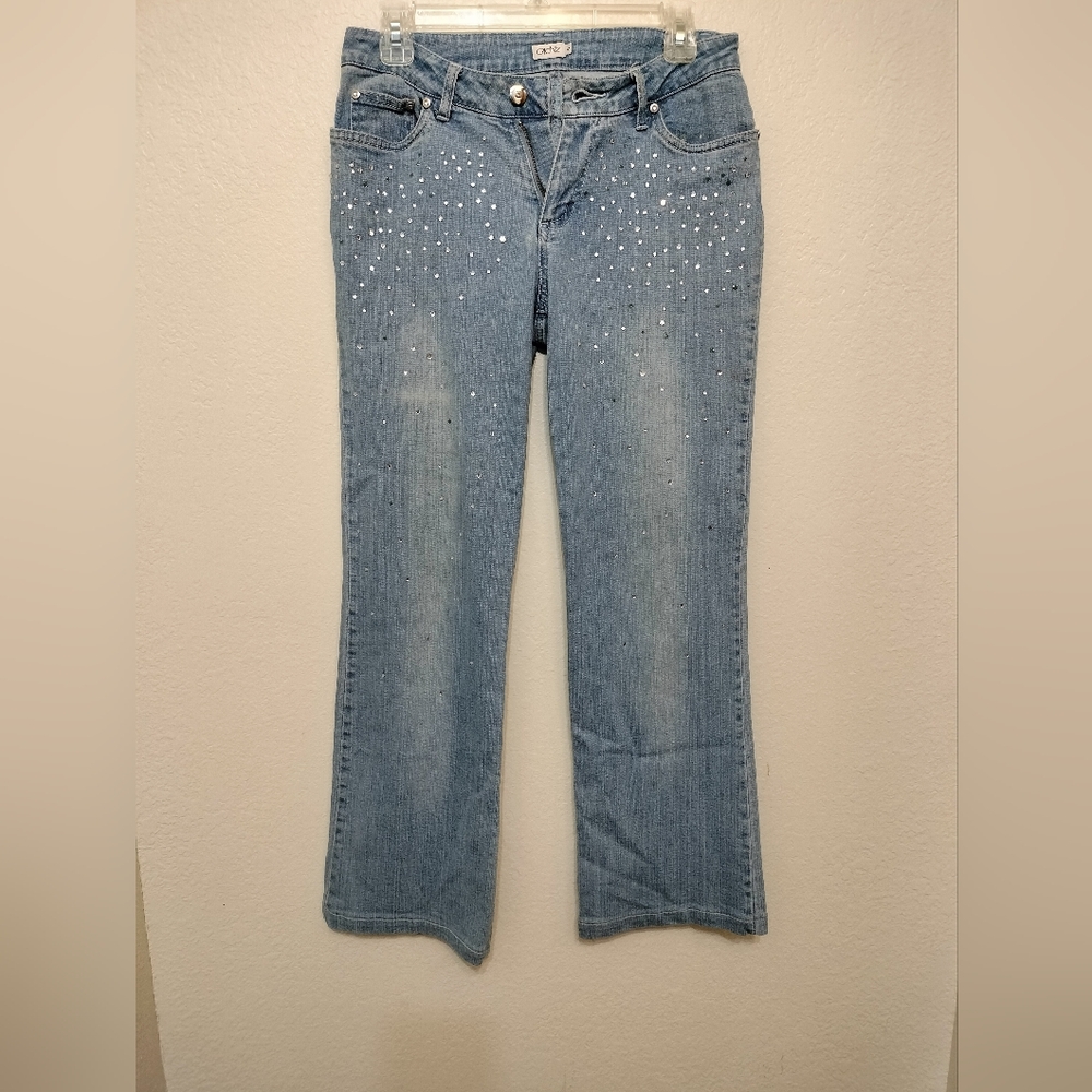 Rhinestone studded Capri jeans by cache'.